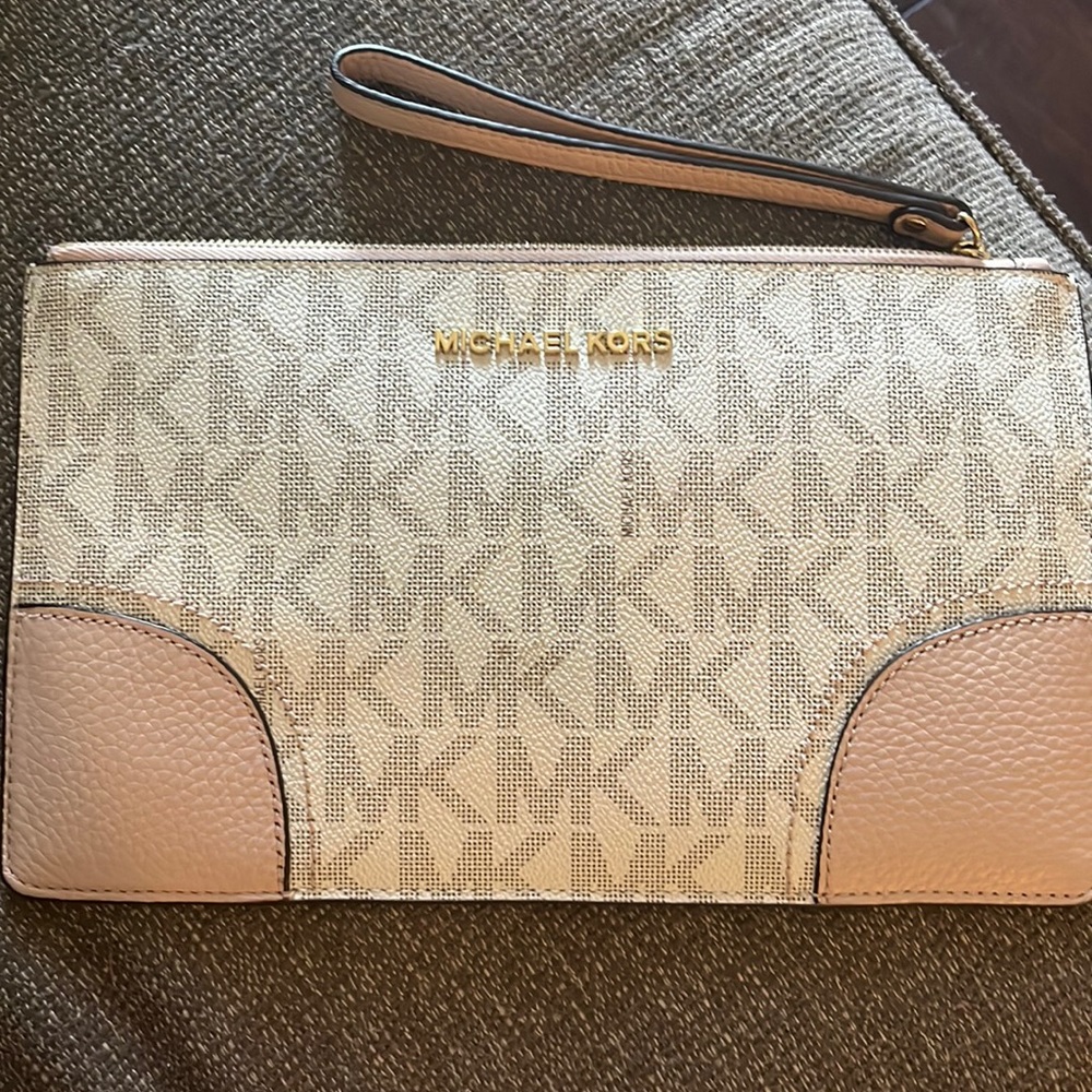 Michael Kors large zip wristlet. Great condition!